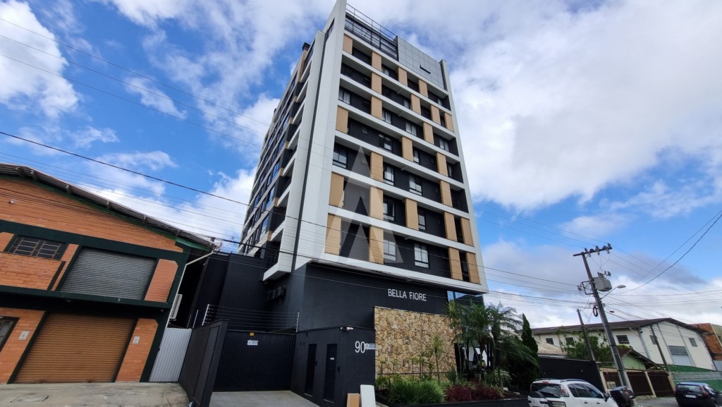 Apartamento mobiliado com 3 quartos sendo suíte no bairro Iririú com sacada com churrasqueira e 2 vagas de garagem - foto 1