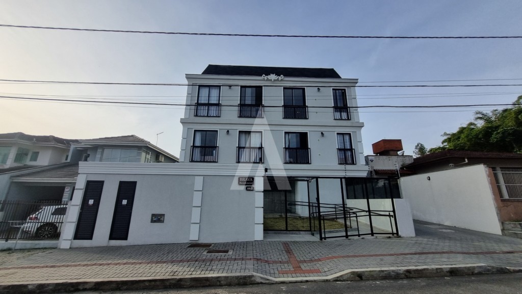 Apartamento localizado no bairro Saguaçu, no 3 andar, com 2 quartos, sendo 1 suíte. - foto 1