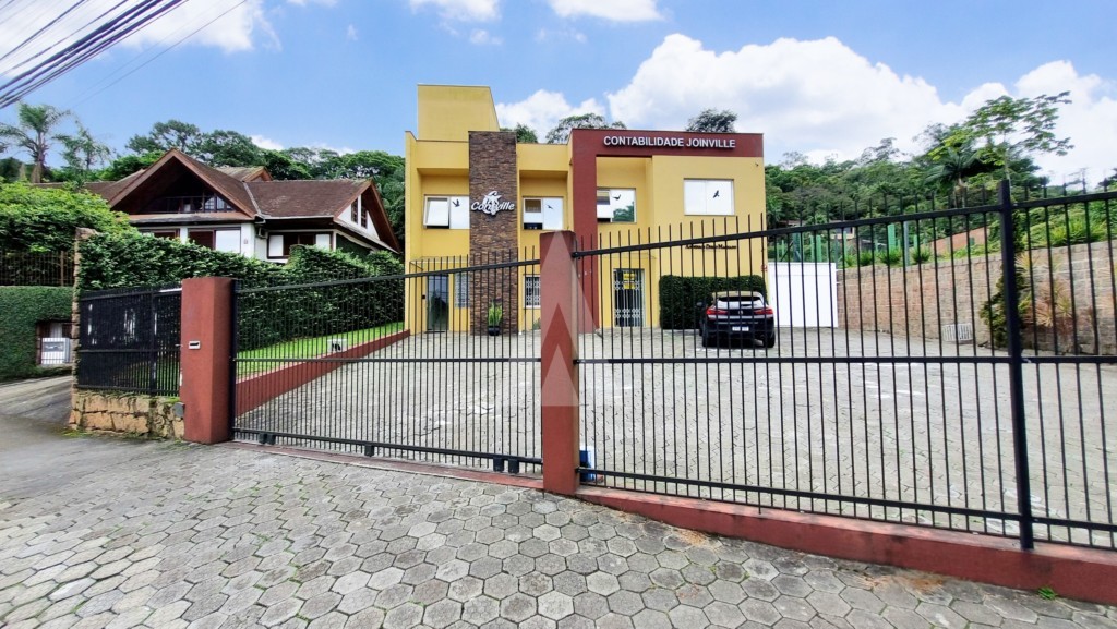 Loja contendo 3 salas, copa com armário e 2 lavabos e com 02 vagas descobertas em frente ao imóvel. - foto 1