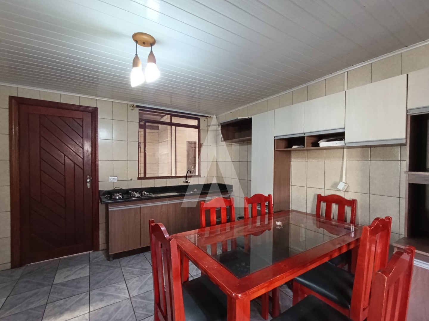 Casa residencial frente e fundos com 3 dormitórios, sendo 1 suite no bairro Adhemar Garcia. — foto 3