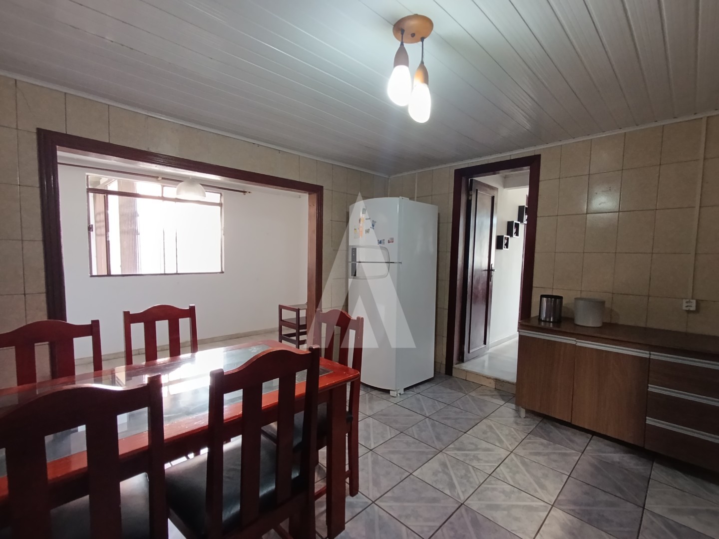 Casa residencial frente e fundos com 3 dormitórios, sendo 1 suite no bairro Adhemar Garcia. — foto 4