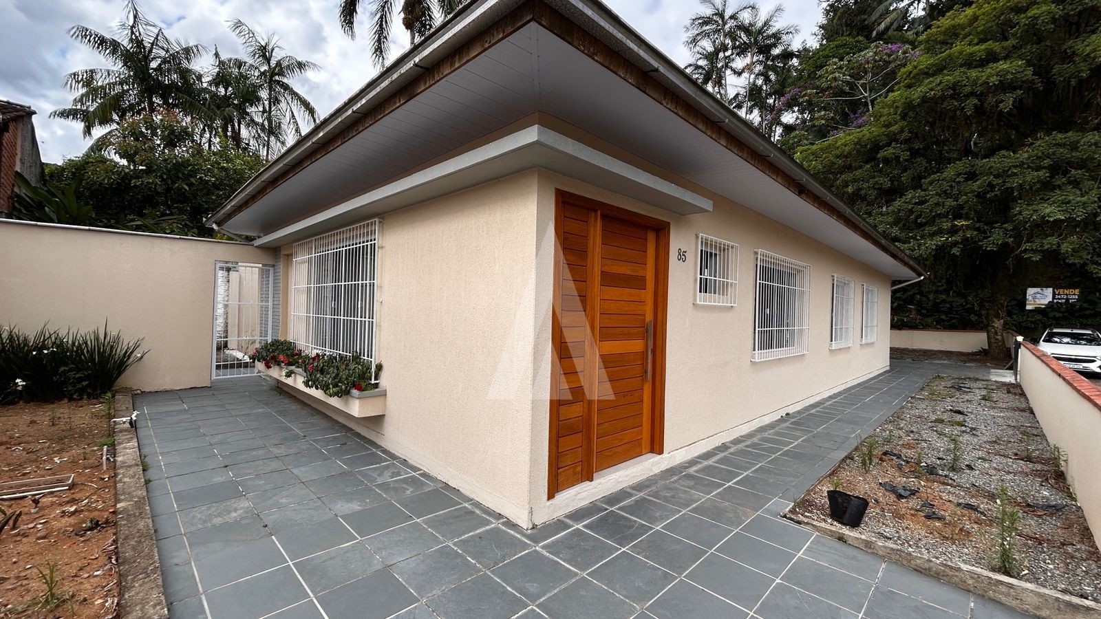 CASA RESIDENCIAL COM 3 QUARTOS SENDO 2 SUÍTES, AMPLO TERRENO, NO BAIRRO BOA VISTA. — foto 2