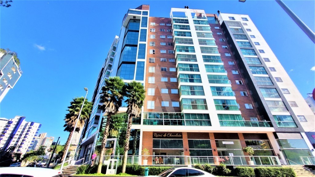 Apartamento no bairro Atiradores com 3 quartos, cozinha com armários, sacada, churrasqueira interna e vaga de garagem dupla. - foto 1