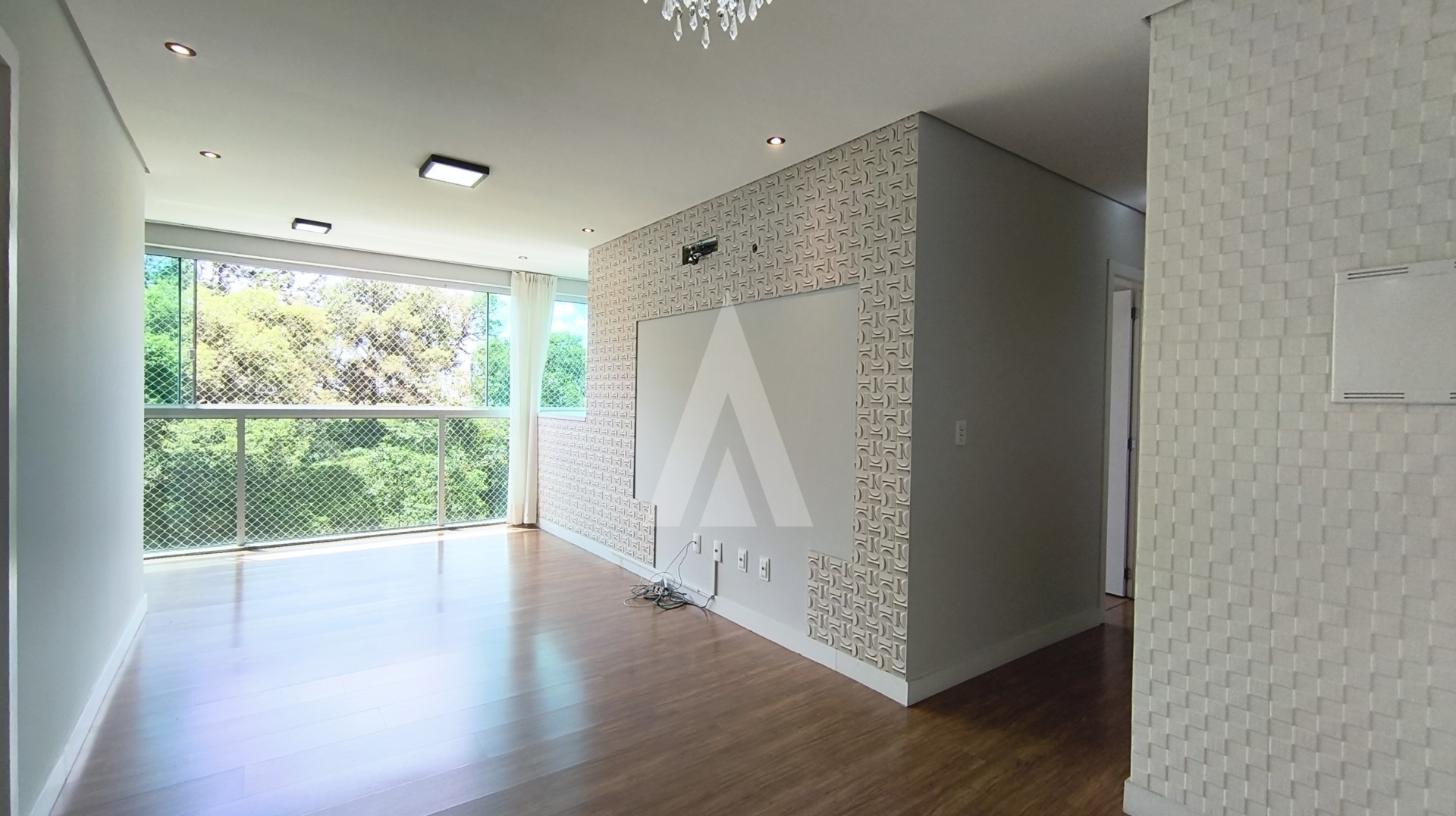 Apartamento no bairro Atiradores com 3 quartos, cozinha com armários, sacada, churrasqueira interna e vaga de garagem dupla. — foto 3